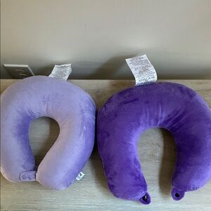 Like new 2 Adult Travel pillows with bottom Snap Purple